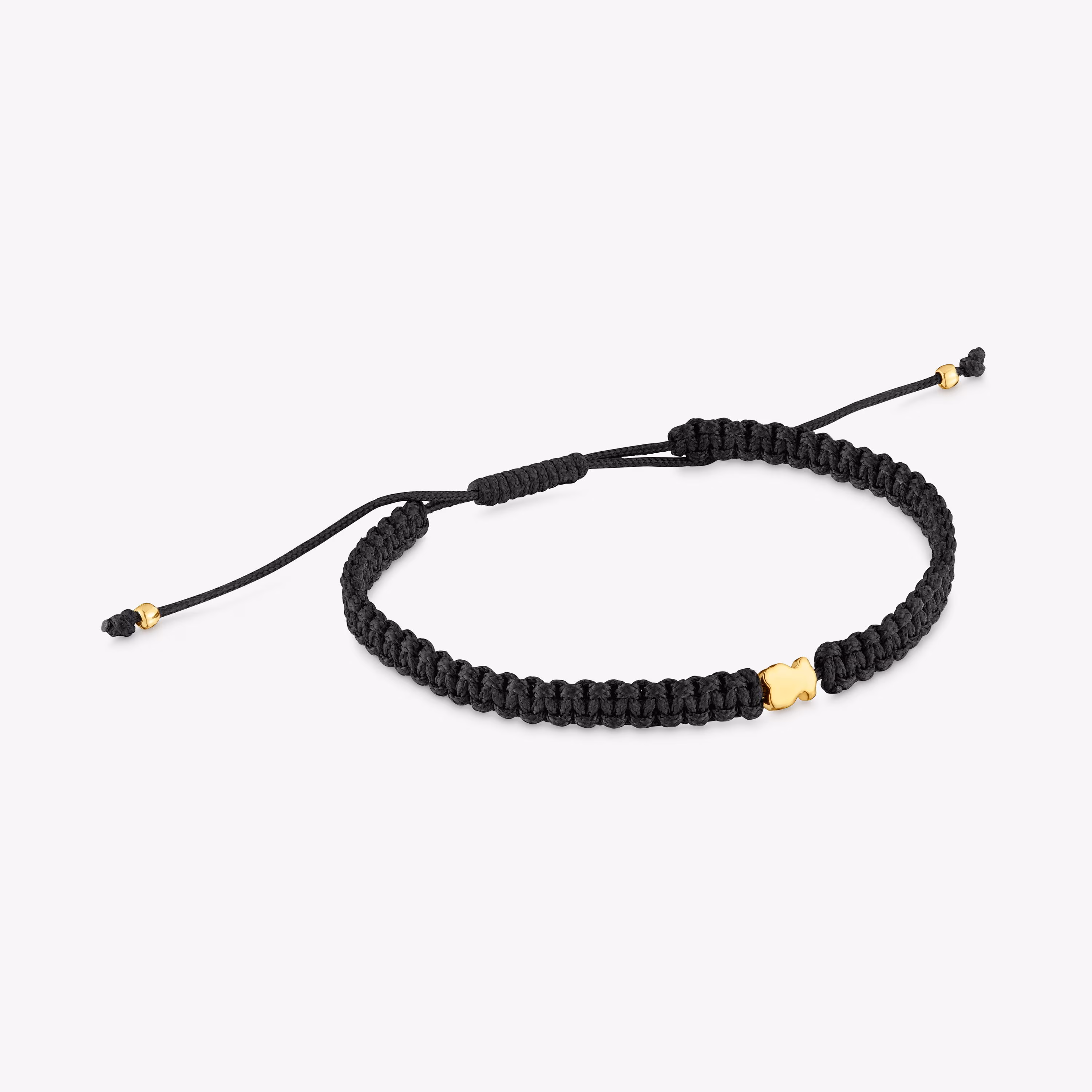 Pulsera oso con baño de oro 18 kt sobre plata y nylon negro TOUS Motivos