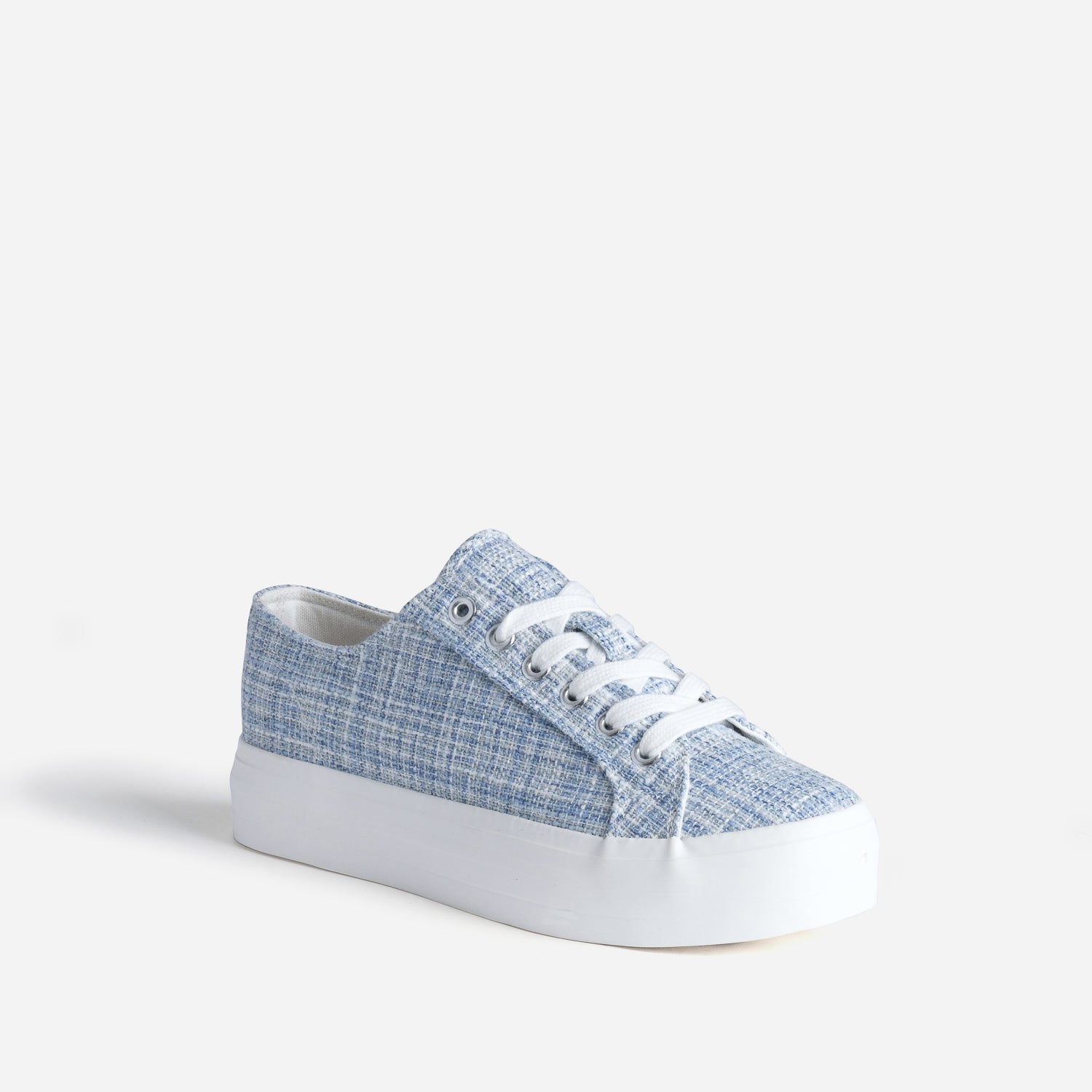 Tennis toile bleue à semelle blanche