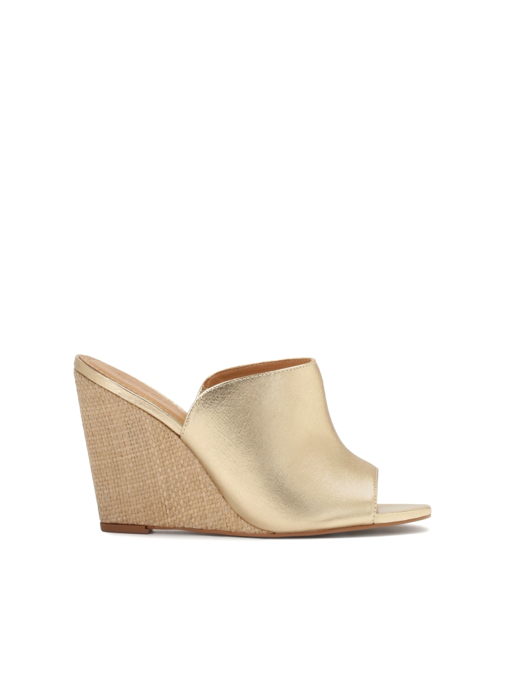 Gold leather mules with raffia heels