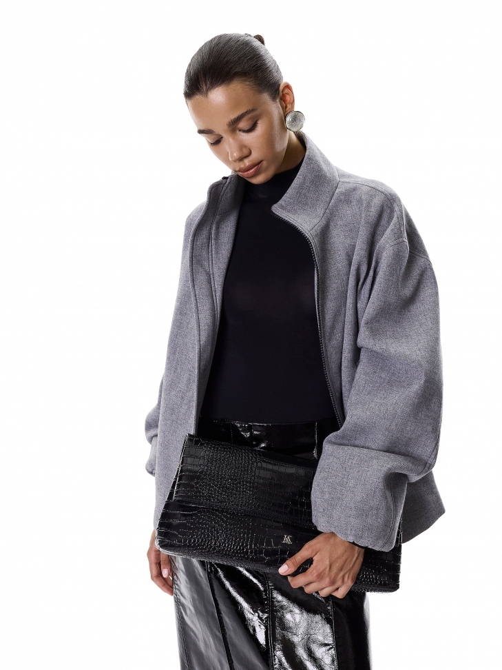 Large embossed leather evening handbag