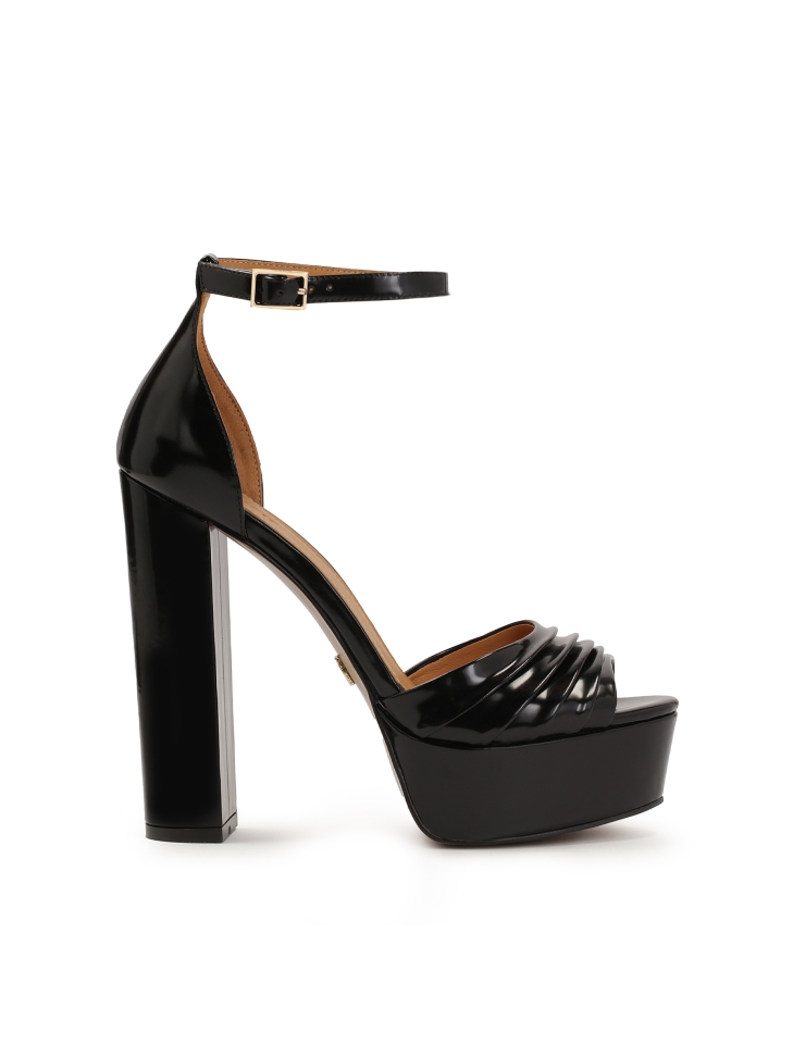 Black sandals with a wide heel and platform