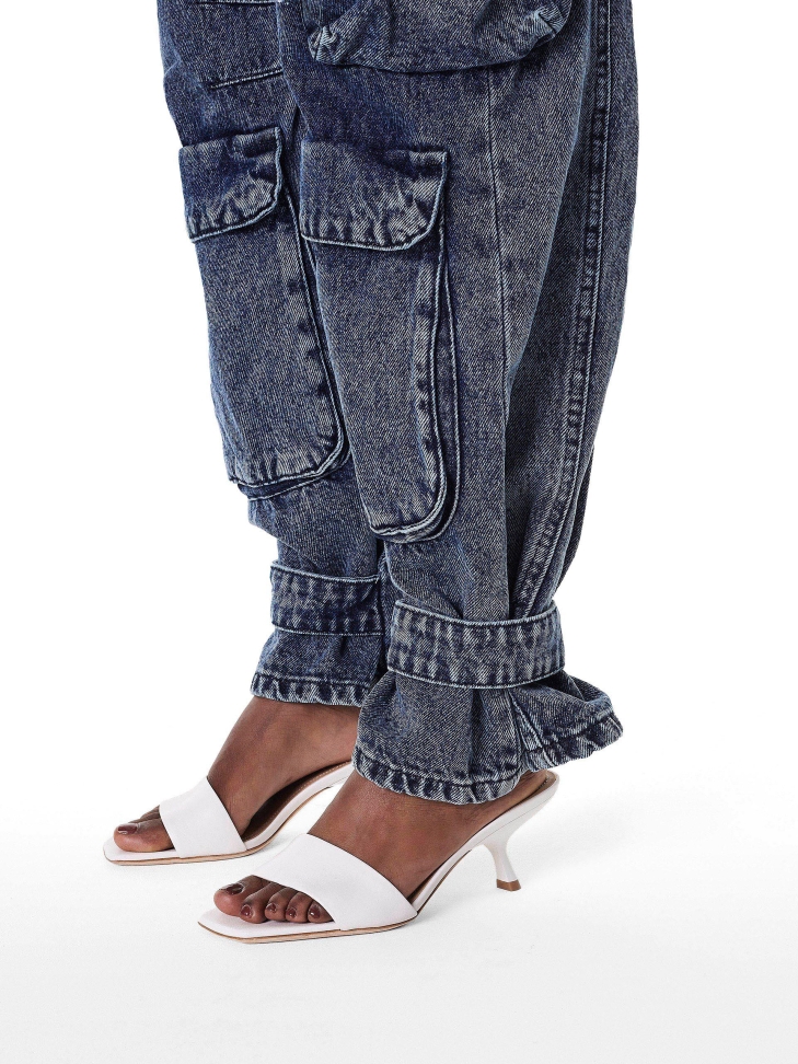 White minimalist mules with fashionable heel