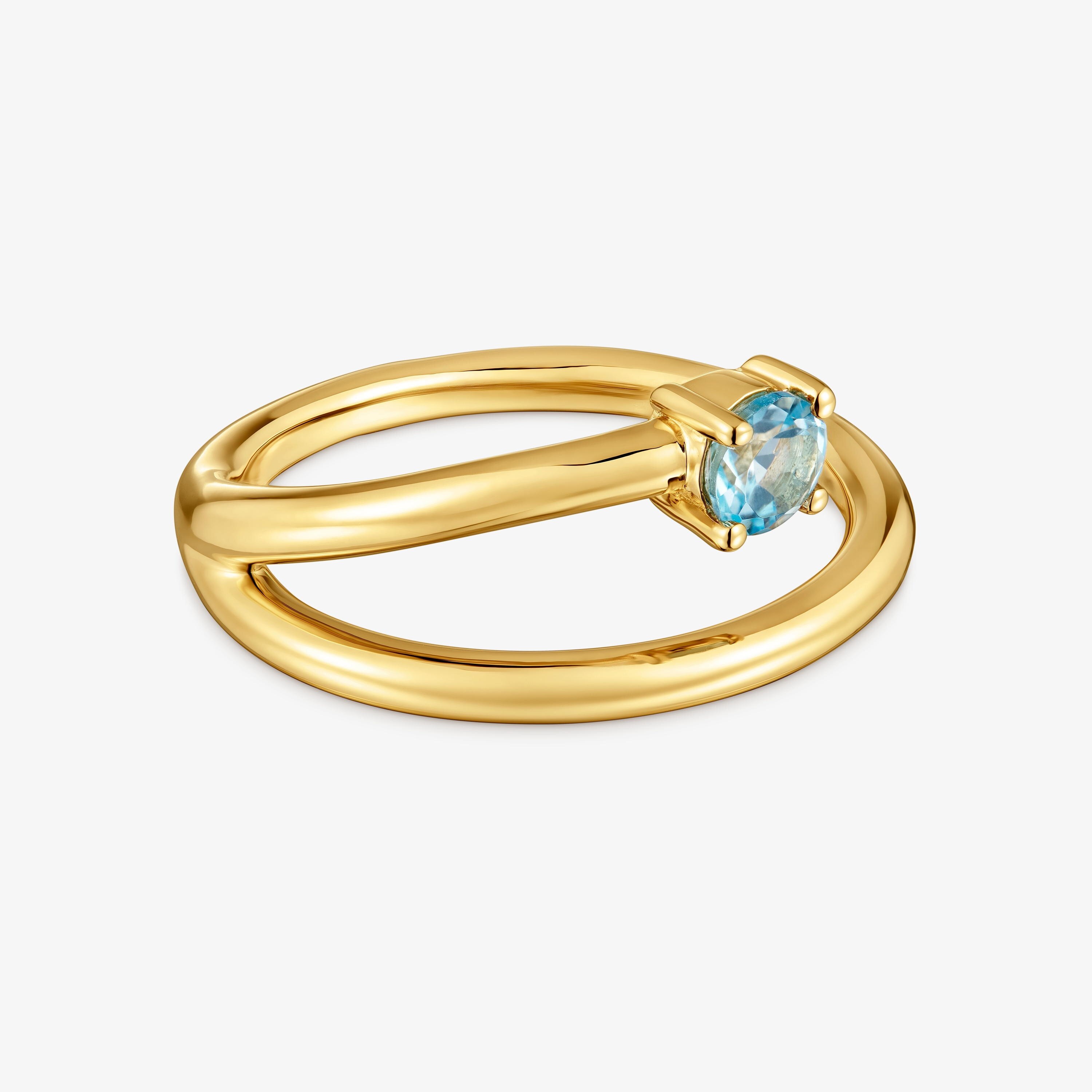 Anillo con baño de oro 18 kt sobre plata y topacio Lio