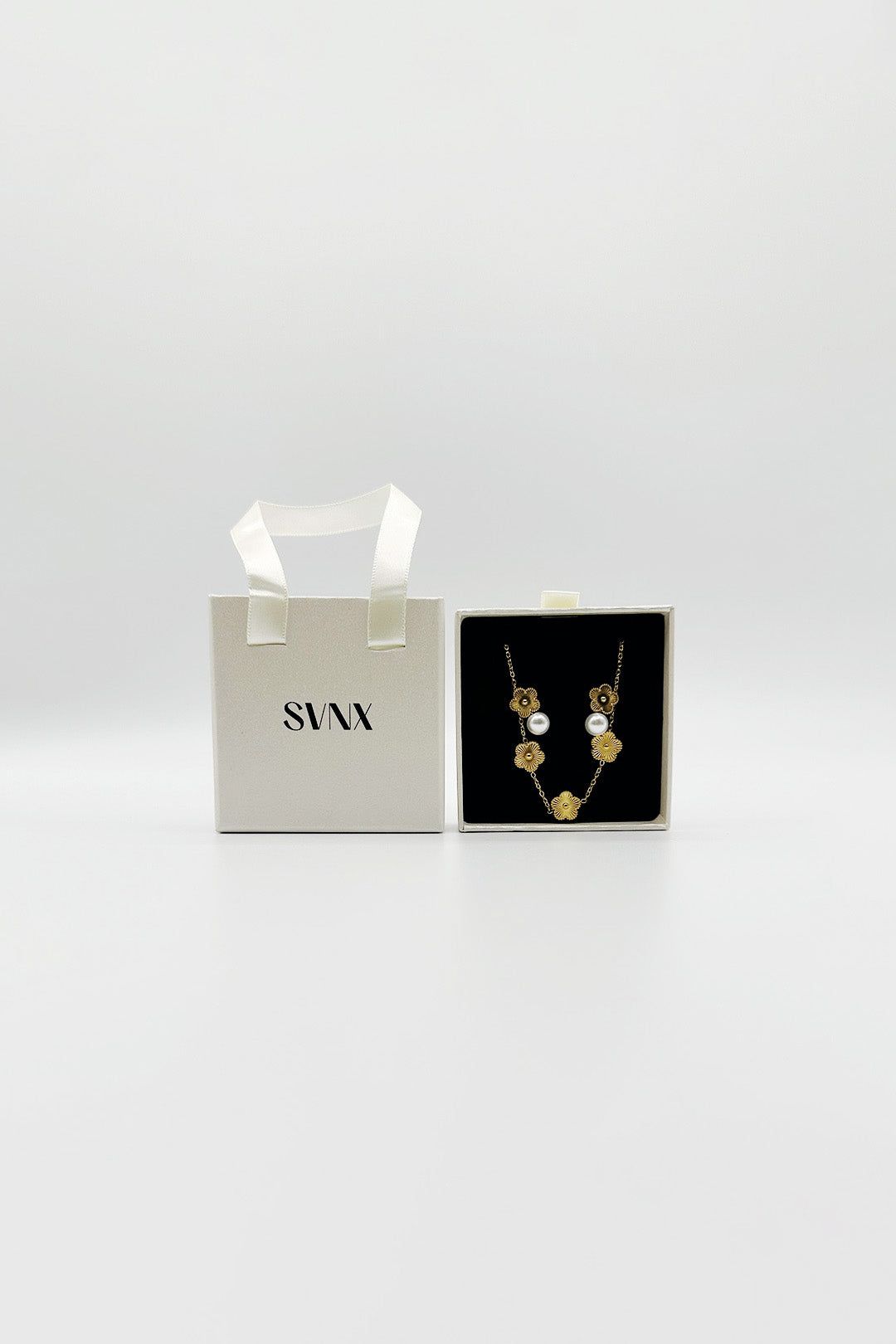 SVNX Floral Pearl Stud Earrings & Bracelet in Gold