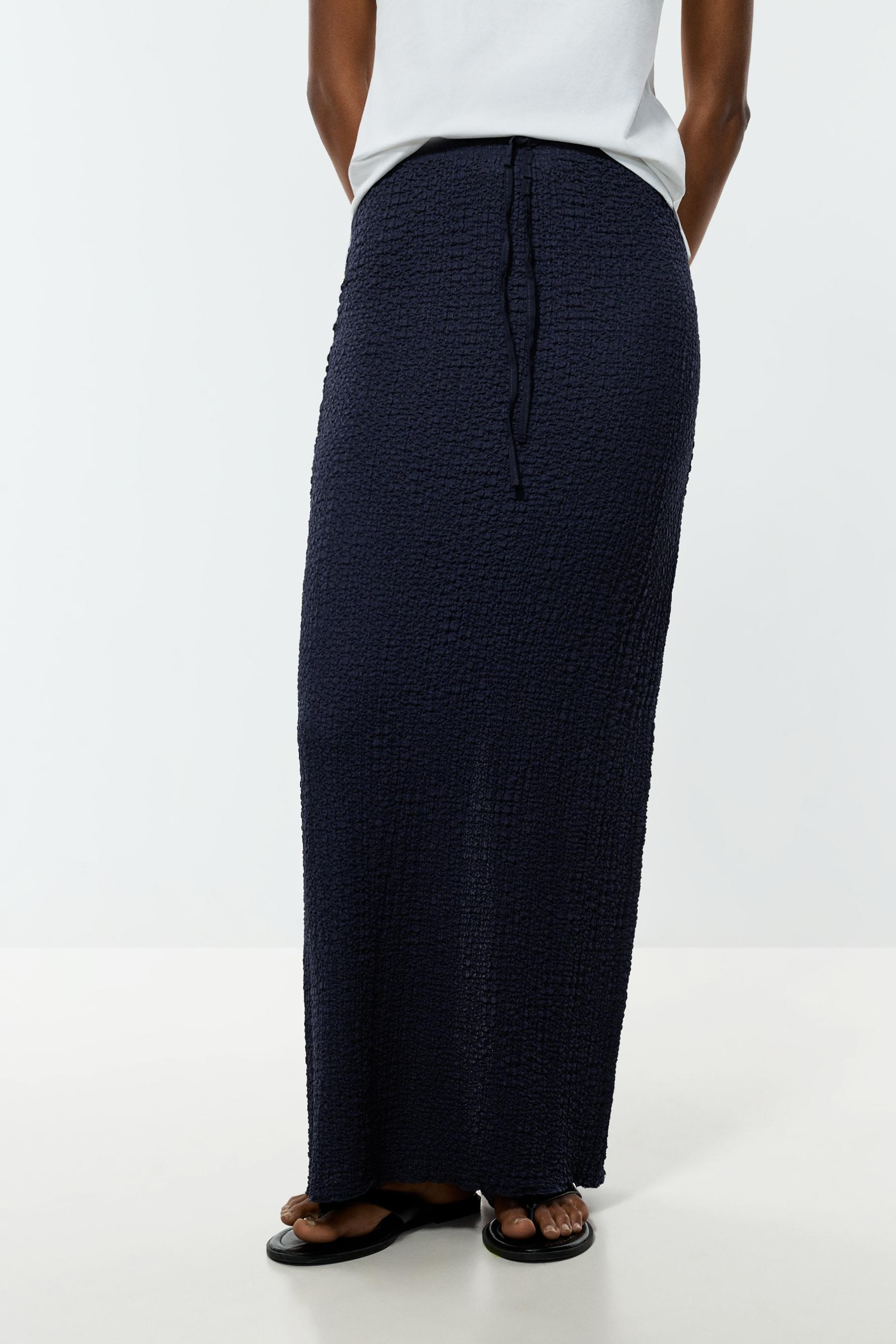 Falda midi textura