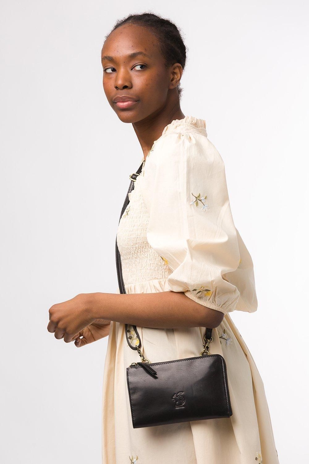 Conkca London Senga' Leather Cross Body Clutch Bag