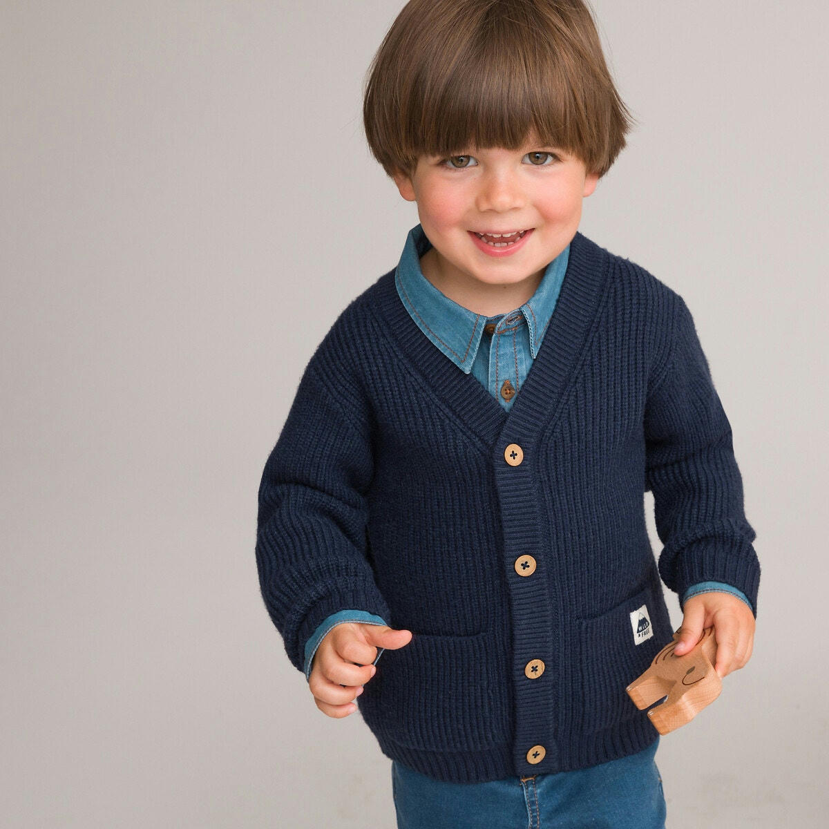 Gilet col V en grosse maille boutonné