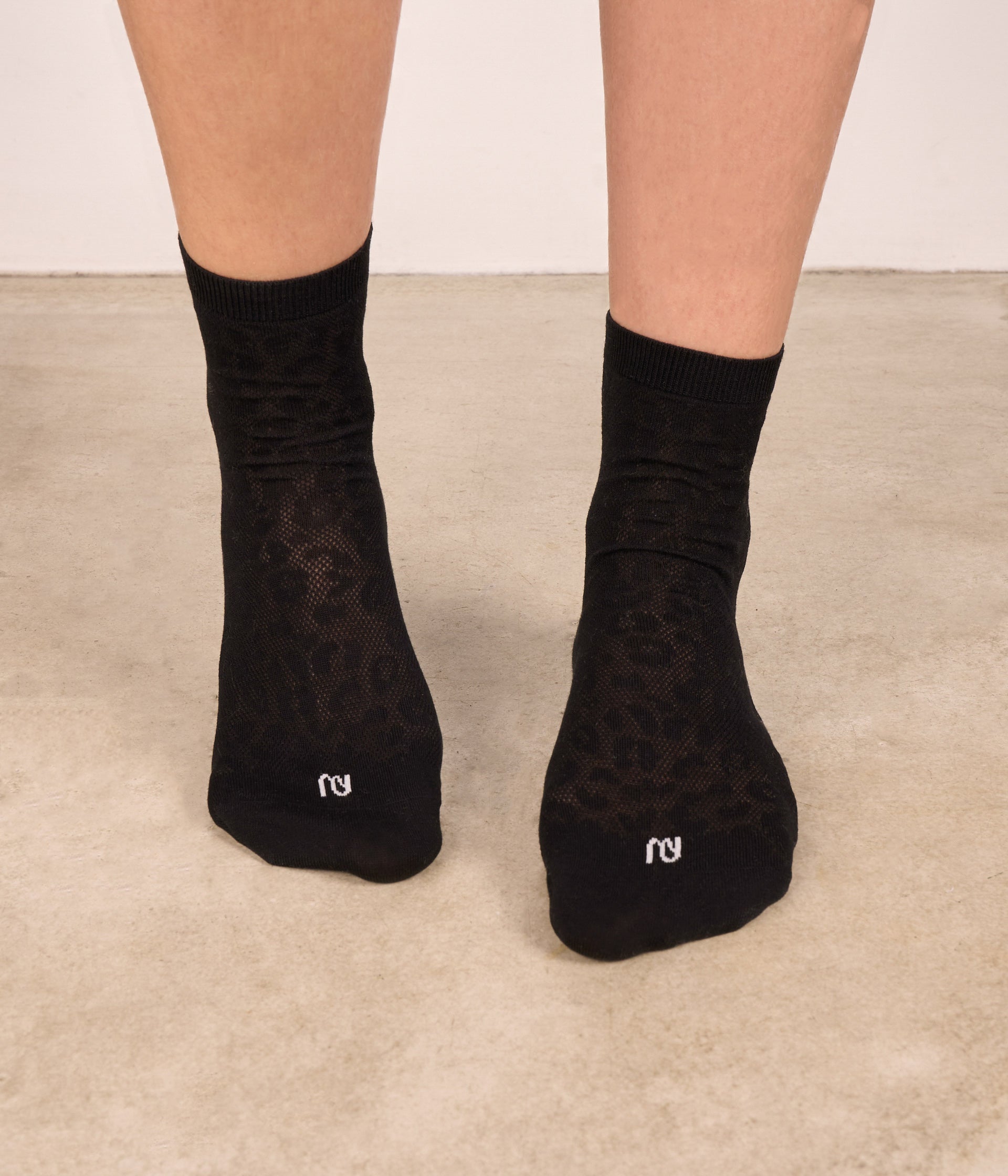 Chaussettes noires léopard Rina