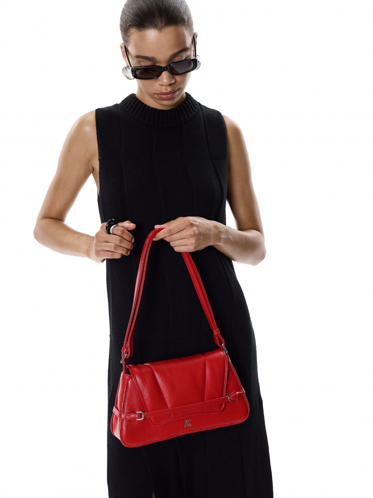Red handbag with a unique shape