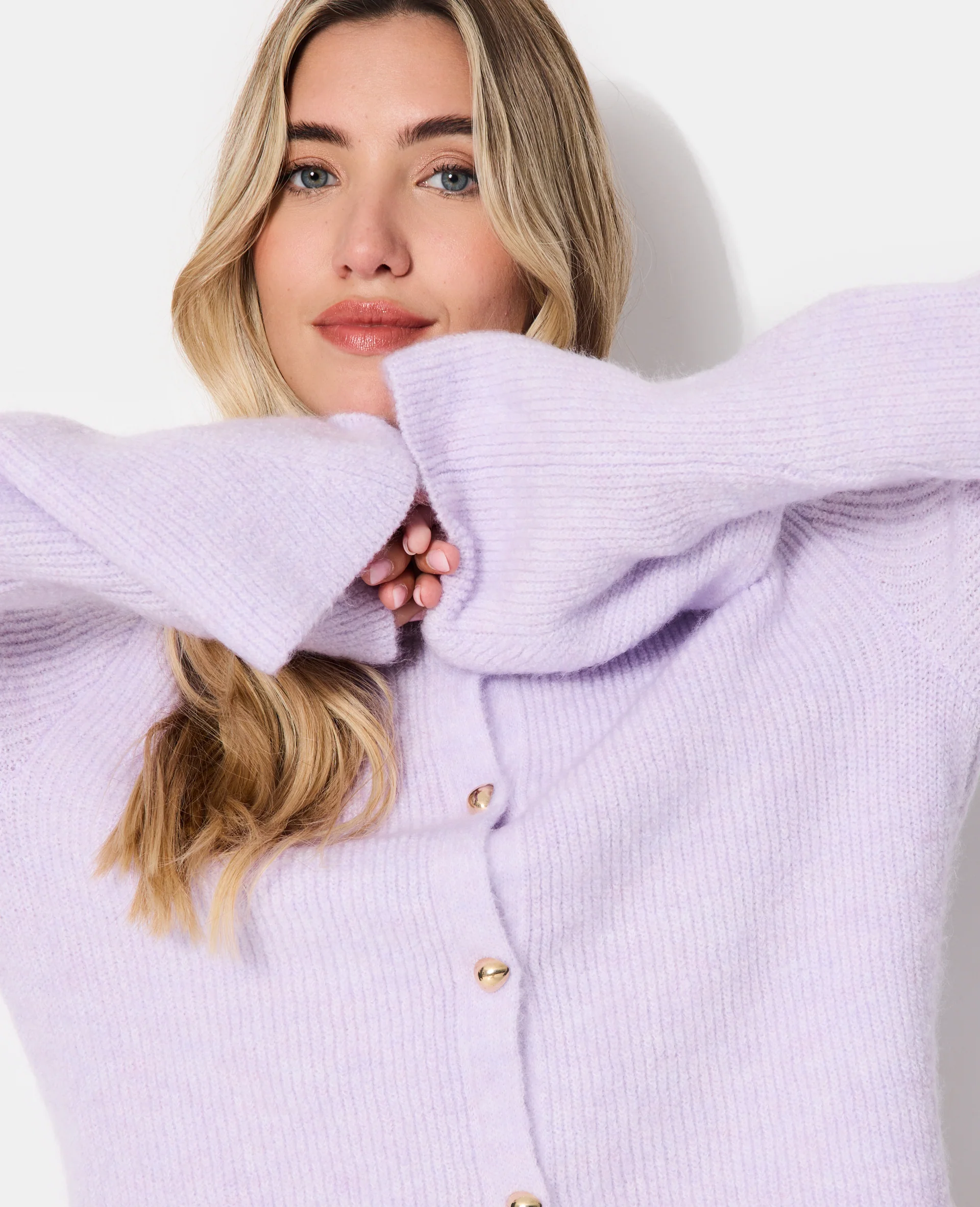 Gilet manches flare avec boutons métal