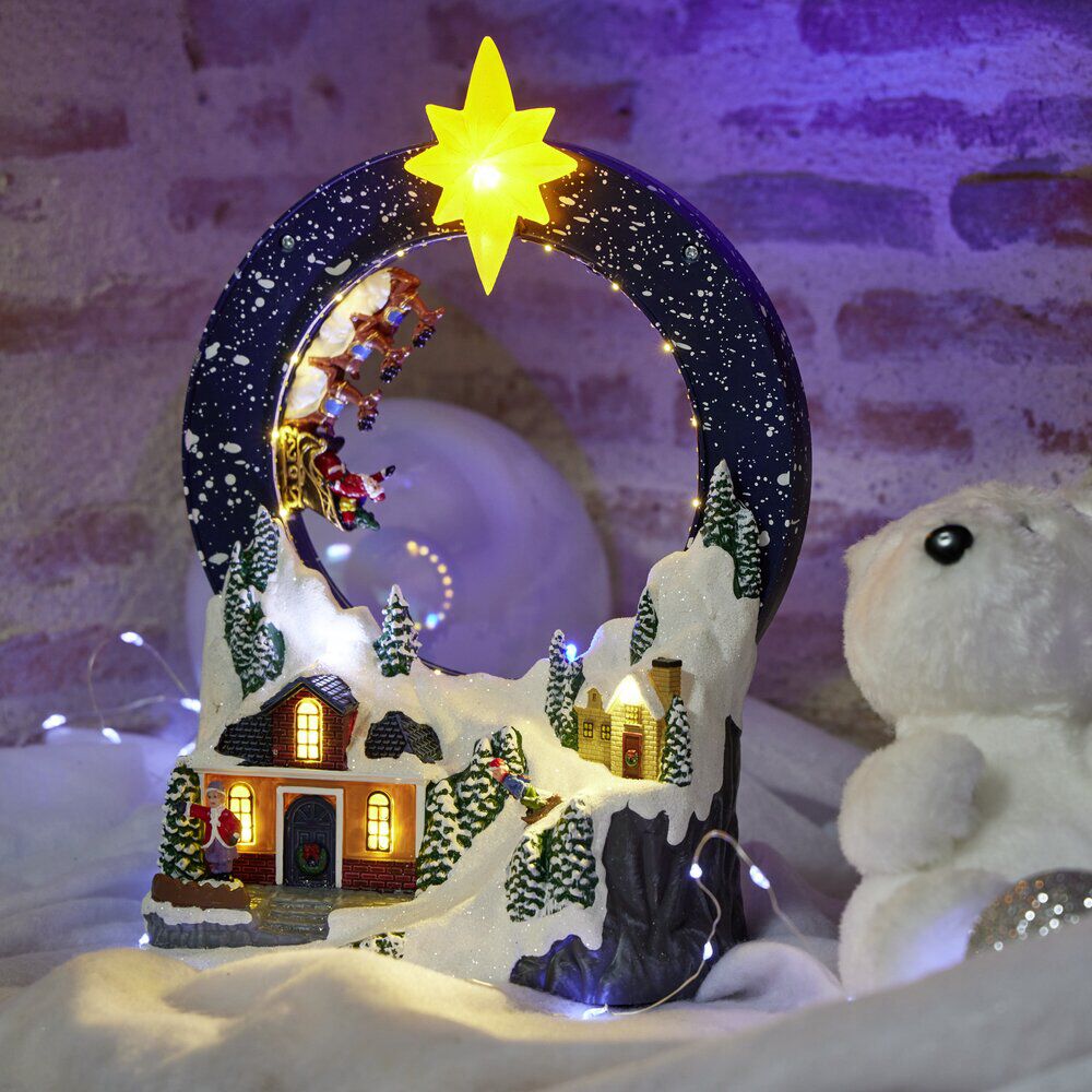 Village animé et lumineux avec maisons et traineau Père No&euml;l 19x11xH29cm