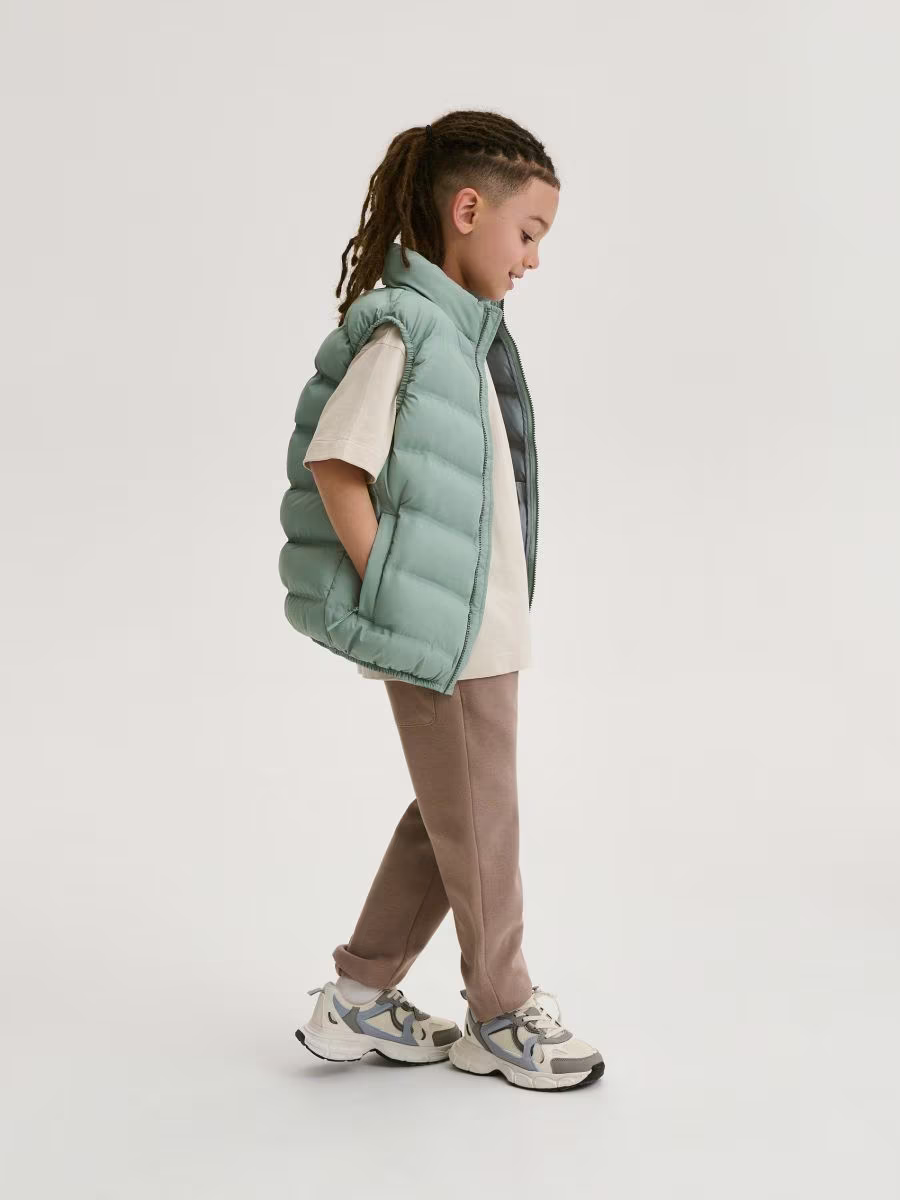 Vest With Stand Up Collar