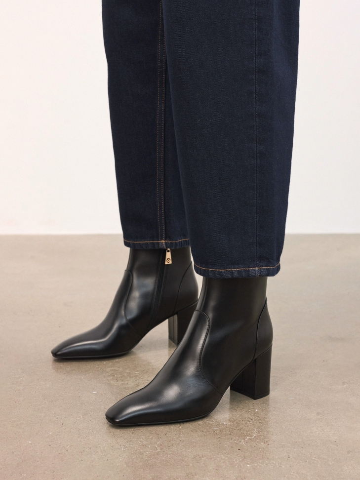 Black leather boots on block heel