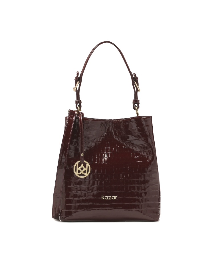Maroon patent handbag with exotic pattern