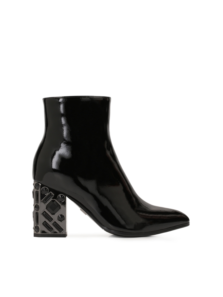 Black patent leathered booties with a metal heel decorated with crystals