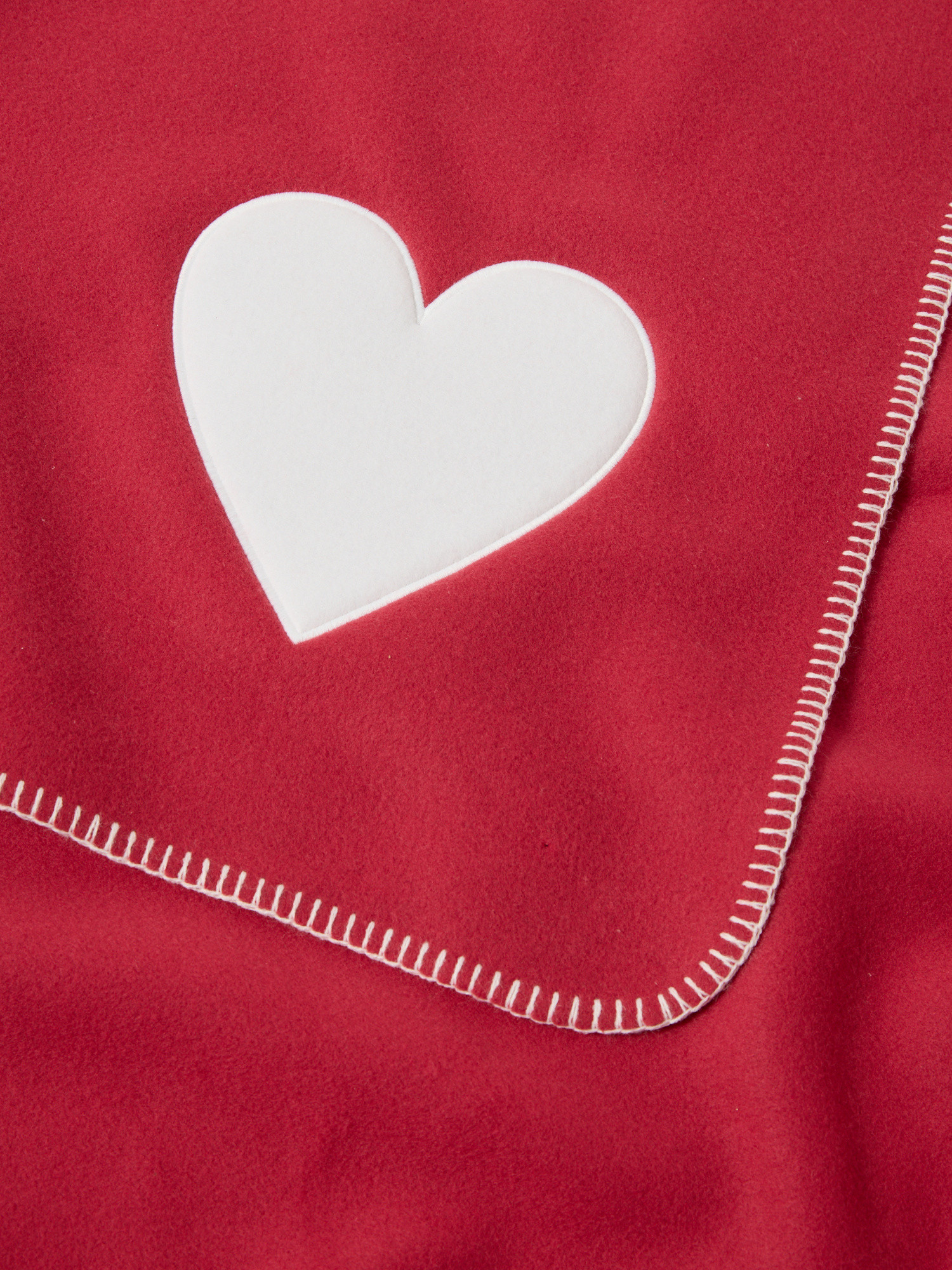 Plaid in pile con cuore