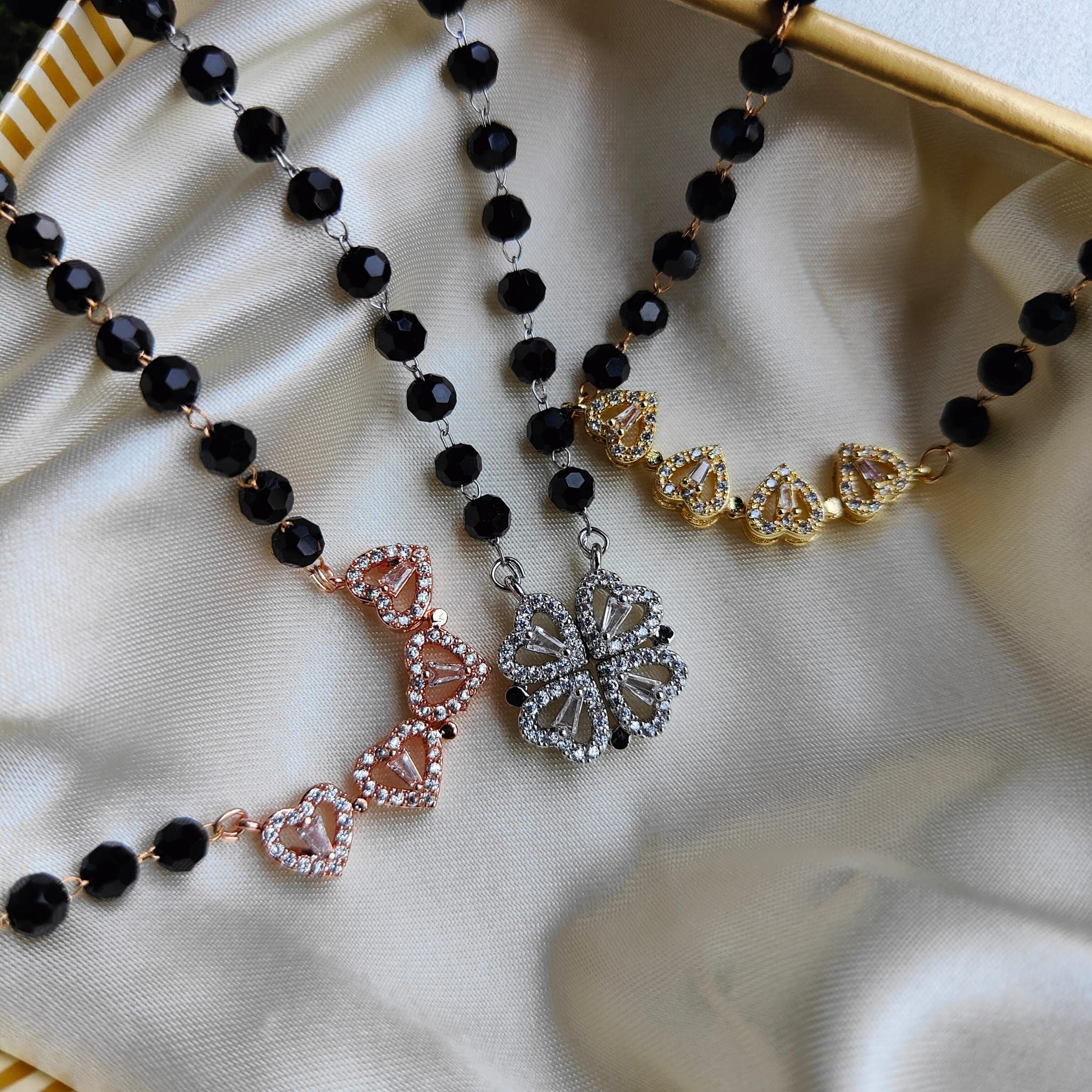 The Colourful Aura Black Bead Four Heart Magnet Foldable Zircon Mangalsutra Necklace