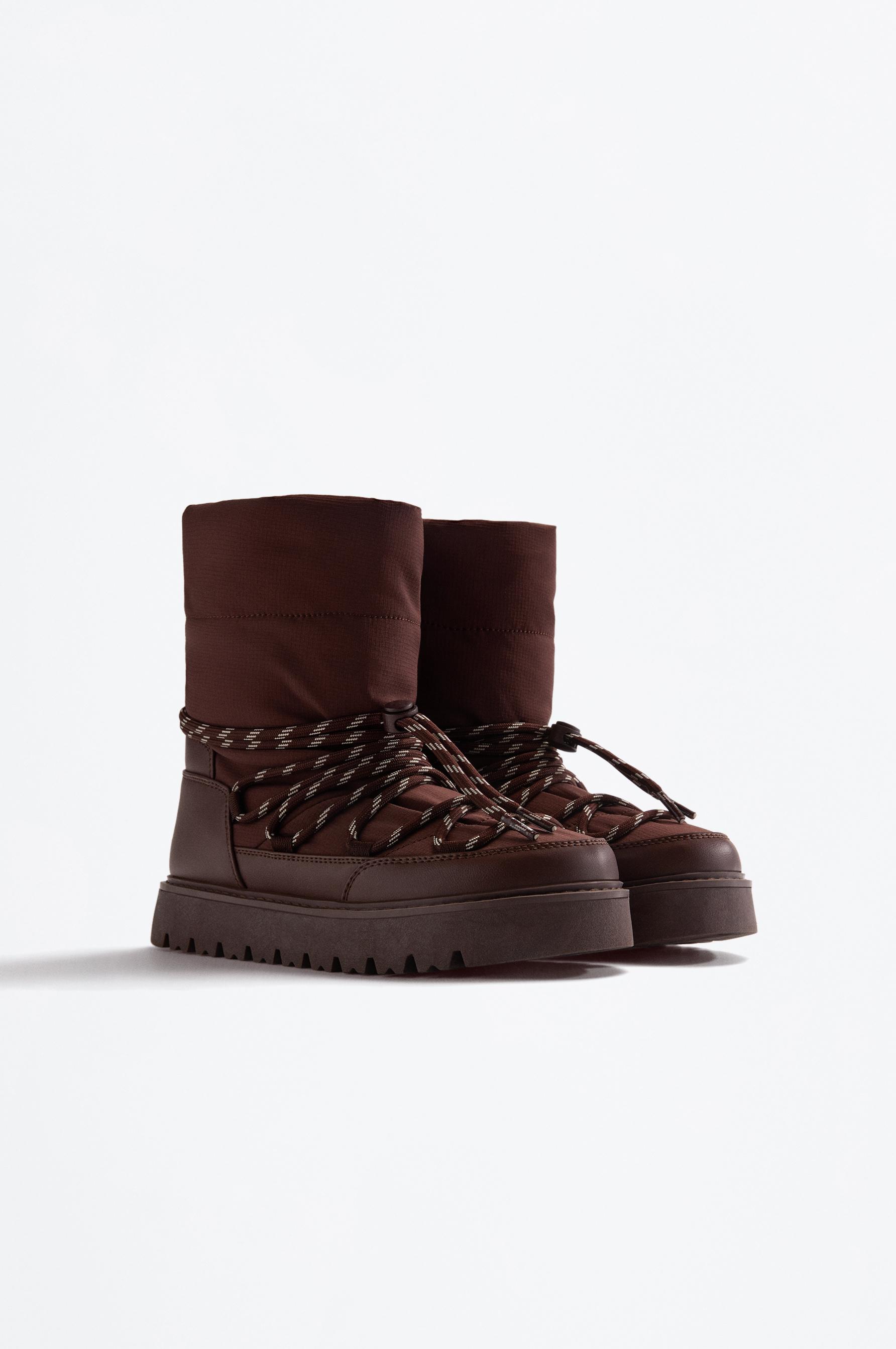 Bota nieve acordonada