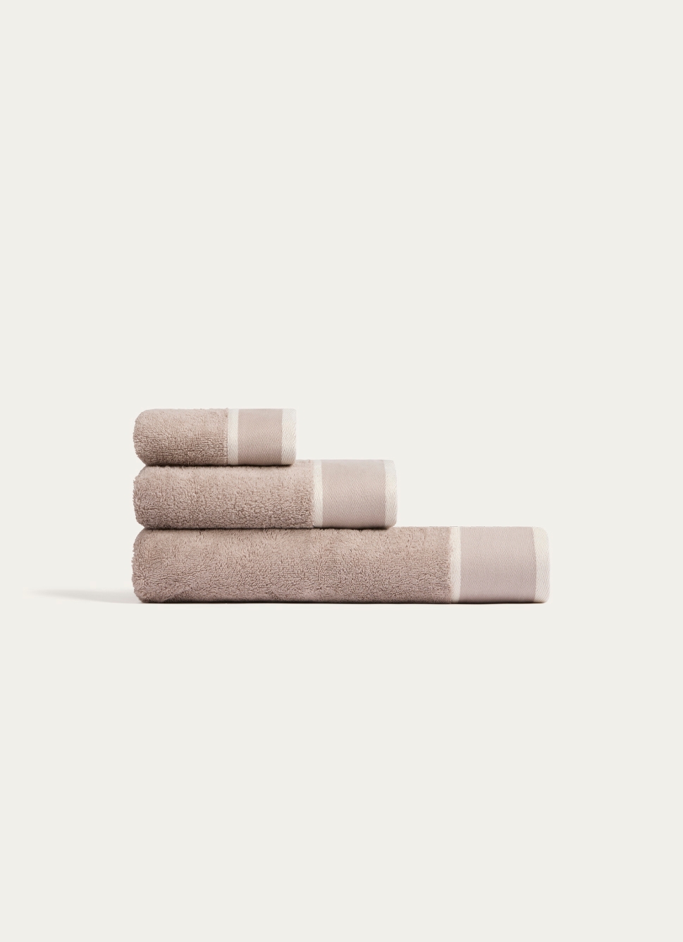 SERVIETTE INVITÉ UNIE à LARGE BORDURE ARTHUR BEIGE FONCÉ