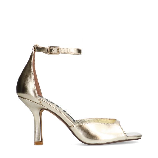 Gouden sandalen met hak