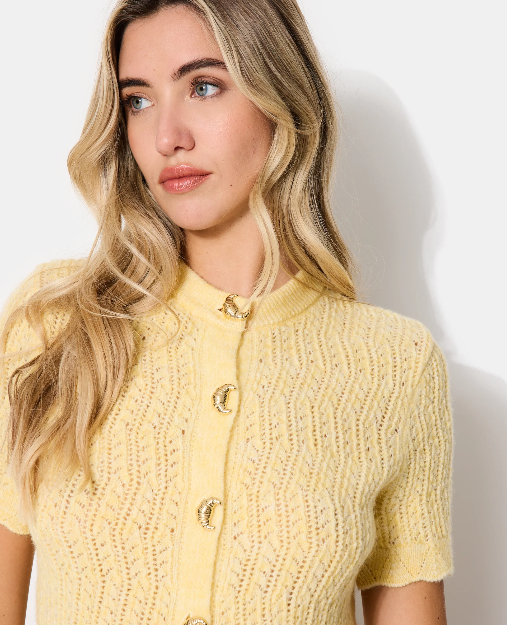 Gilet manches courtes en maille ajourée