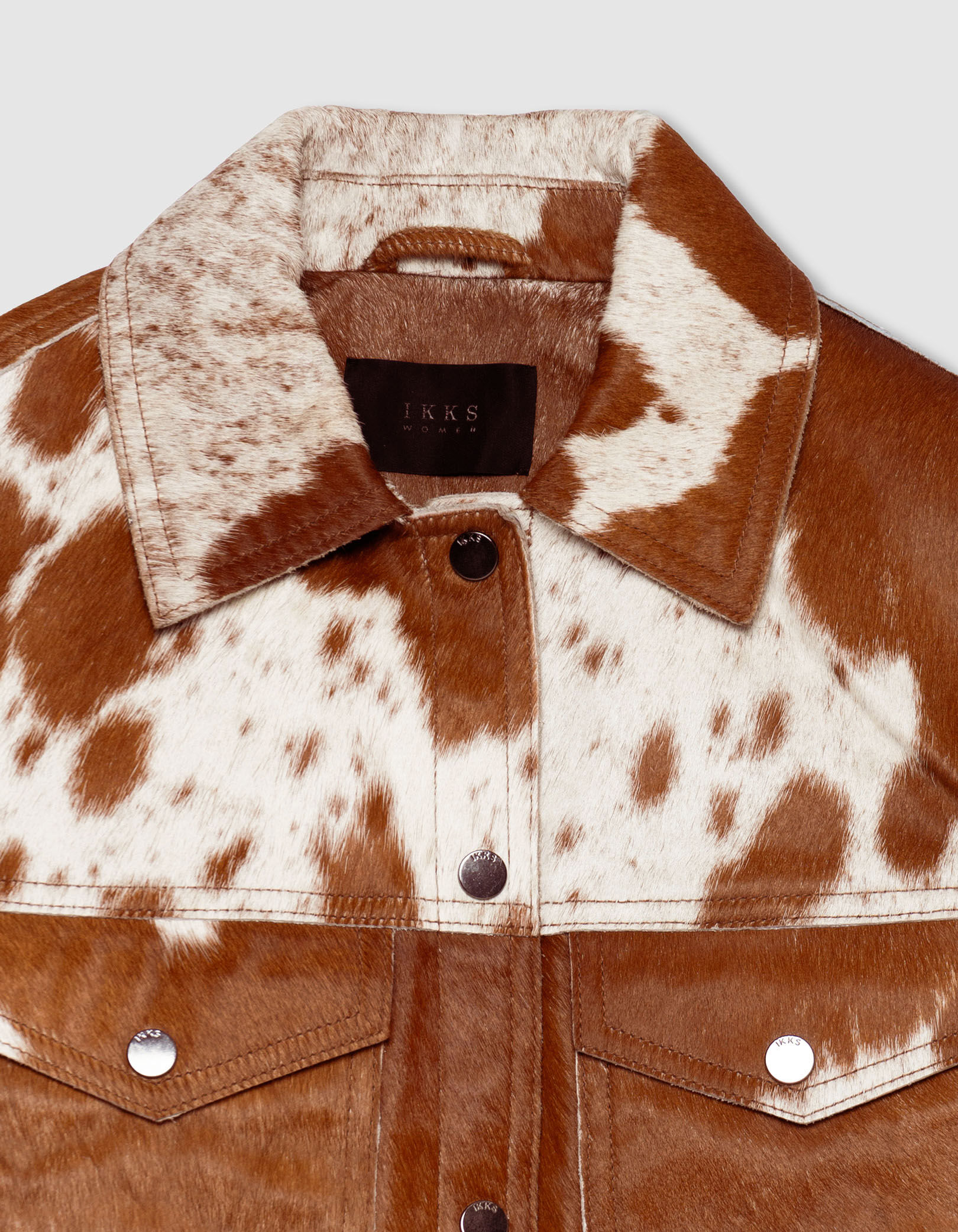 Veste courte en cuir marron motif vache Femme