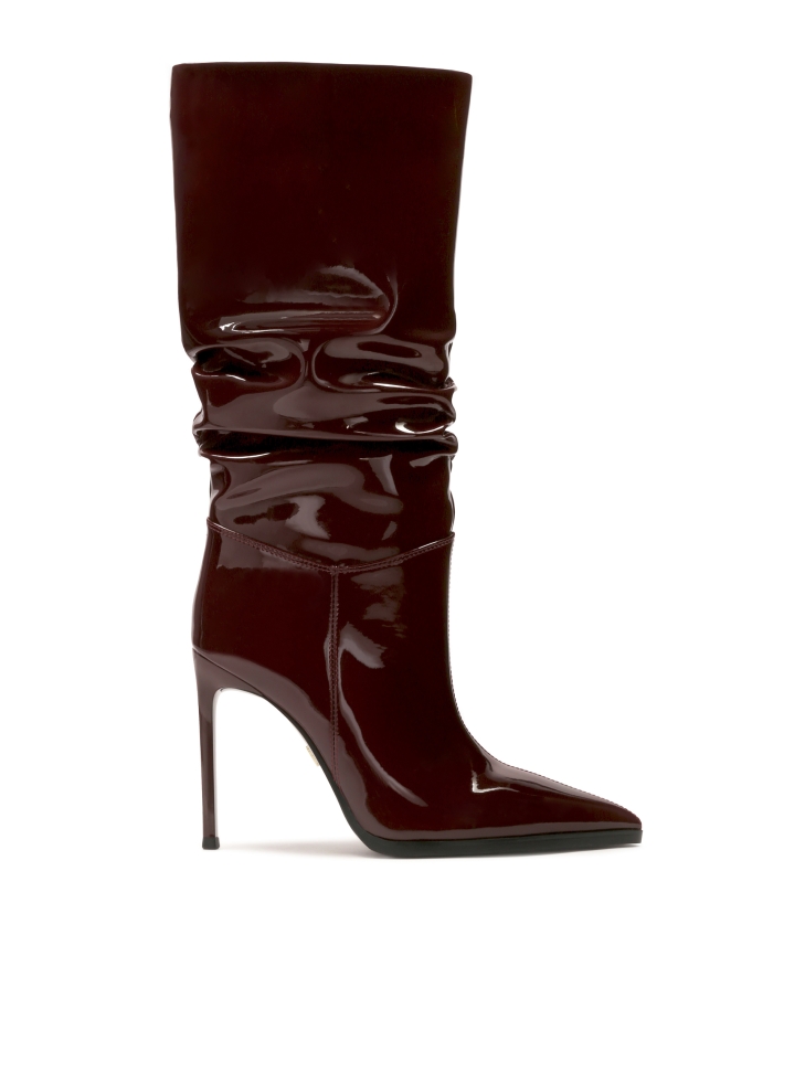 Maroon boots on a slender stiletto heel