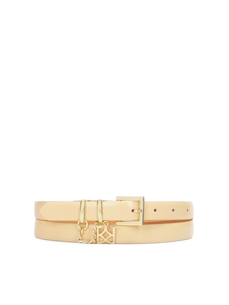 Narrow beige belt embellished with KAZAR monogrammed chain