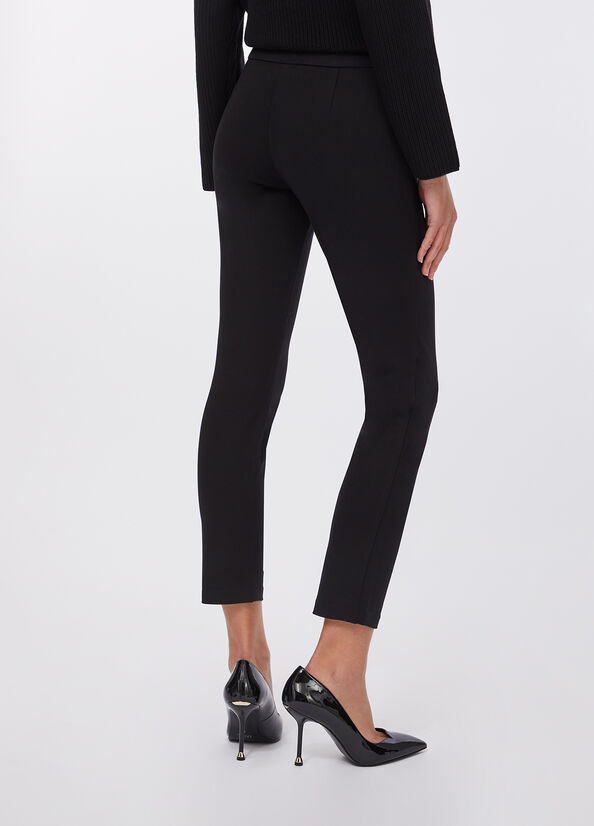 Pantaloni skinny con bottoni