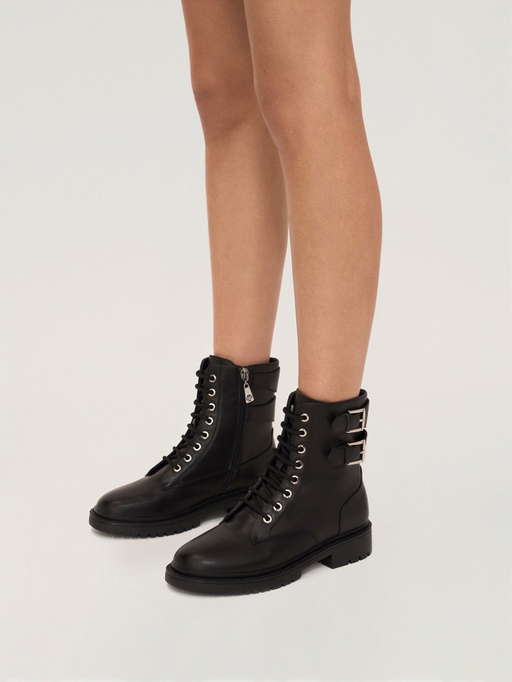 Ladies’ classic flat ankle boots with metal buckles