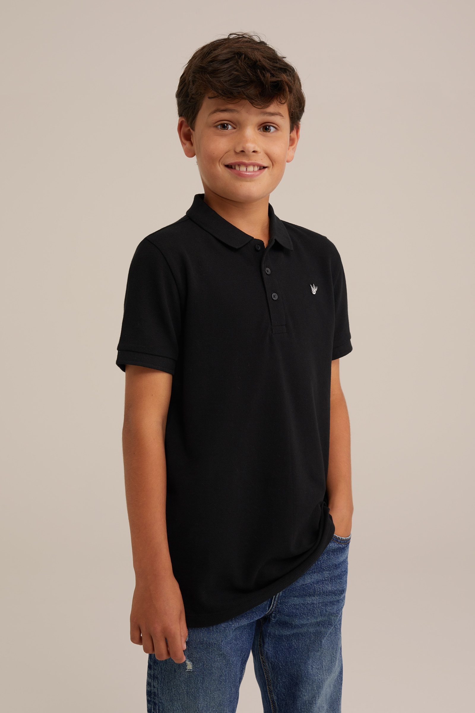 Jongens polo met structuur en embroidery