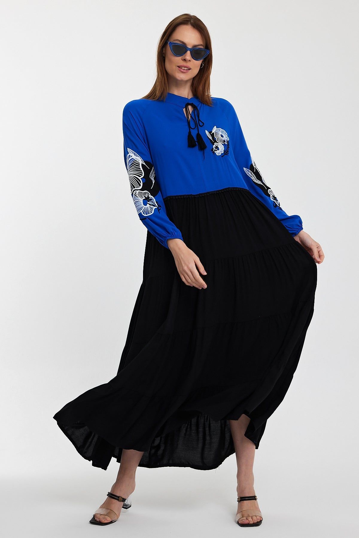 Belissh Embroidered Long Sleeve Midi Dress with Tie Neck Detail in Blue