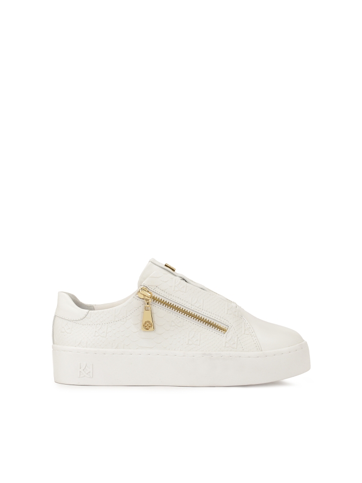 White sneakers with embossed pattern and zipper closure