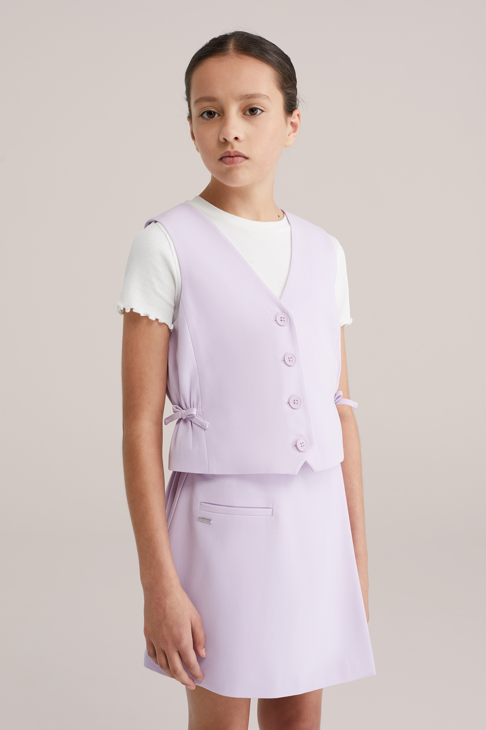 Meisjes gilet met strikdetails