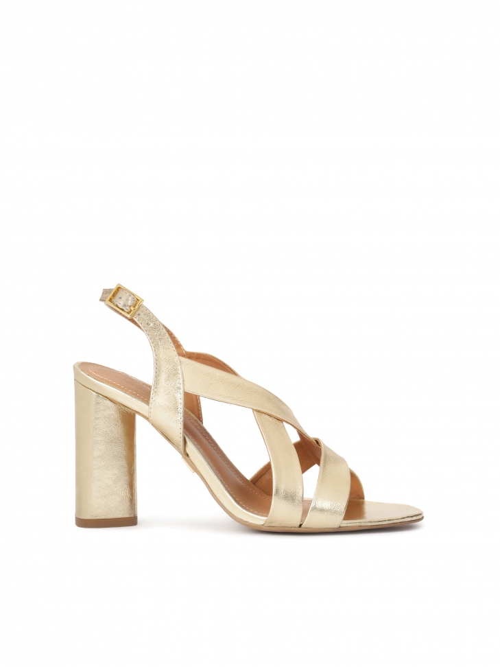 Gold sandals with wide straps