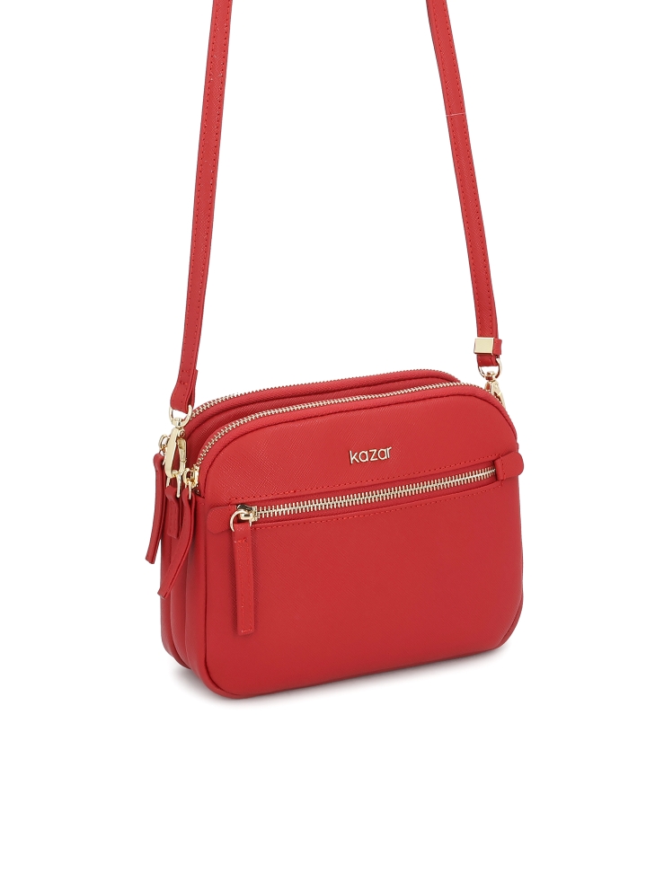 Red leather handbag with three compartments