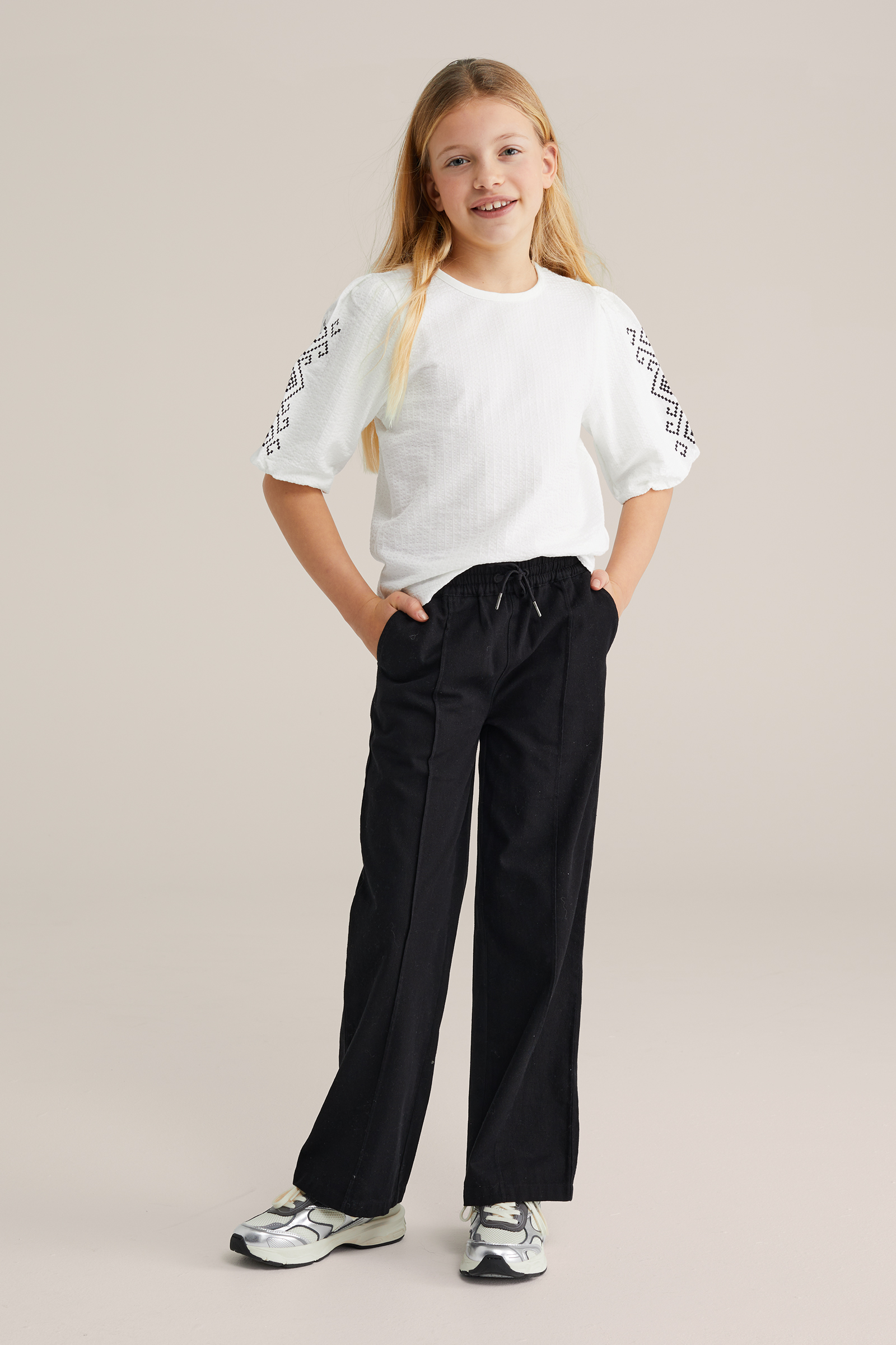 Meisjes seersucker top met embroideries en stretch