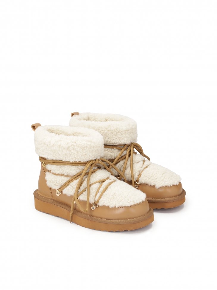 Brown snow boots with fur