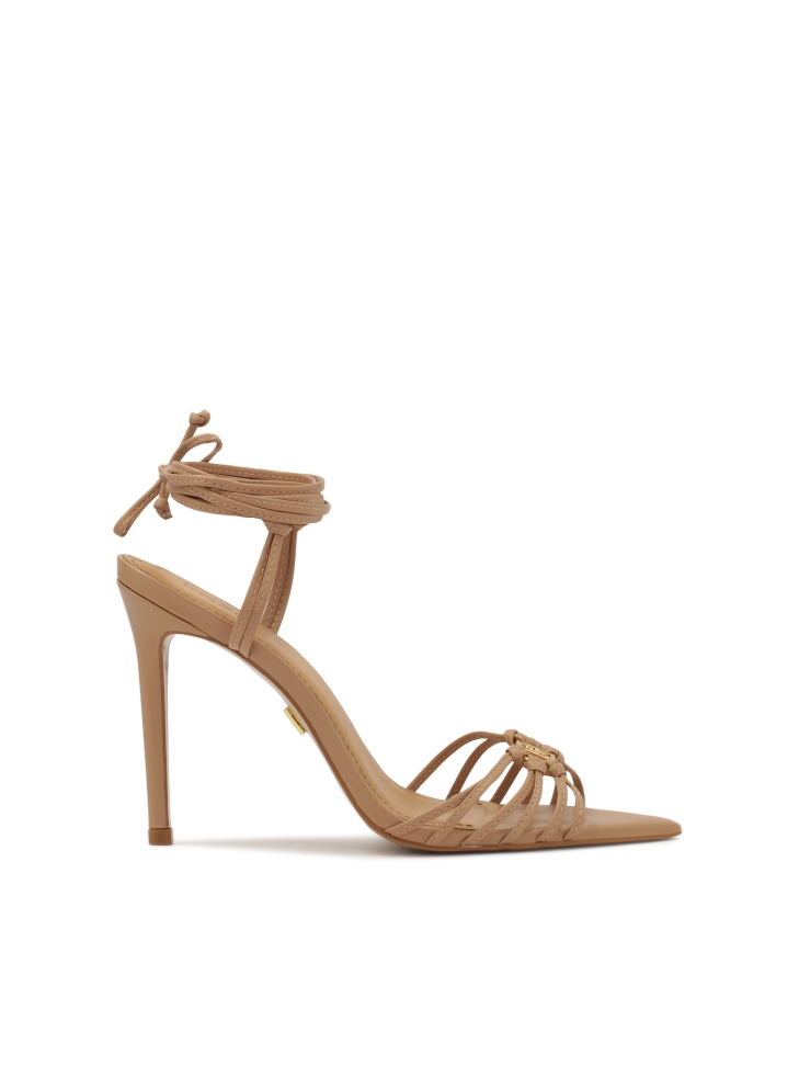 Beige high sandals tied around the ankle