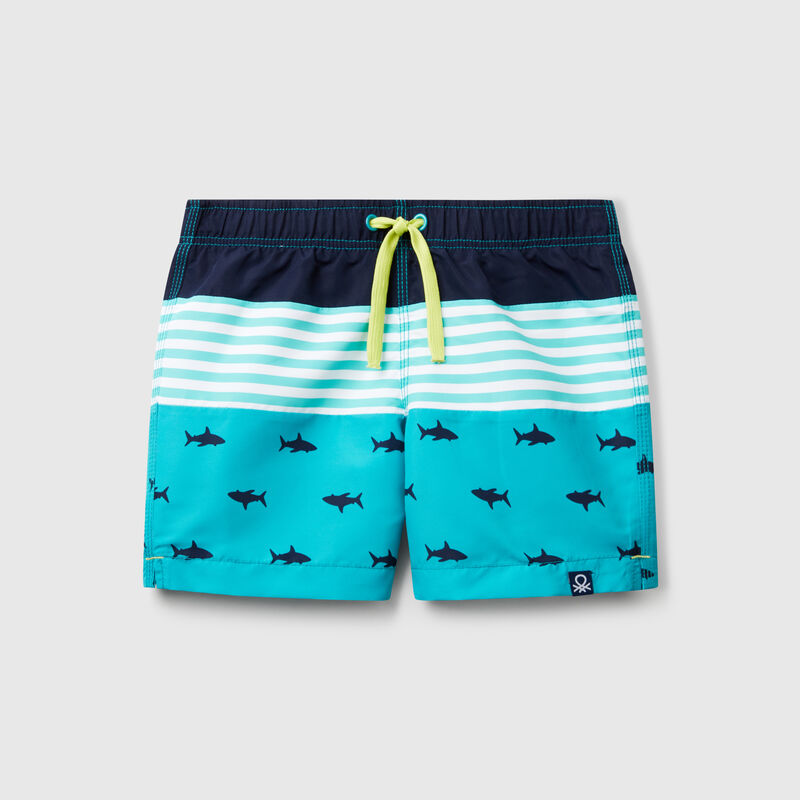 Swim trunks with stripes and sharks