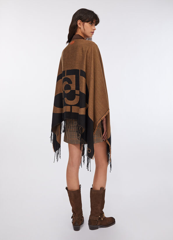 Poncho con logo e frange