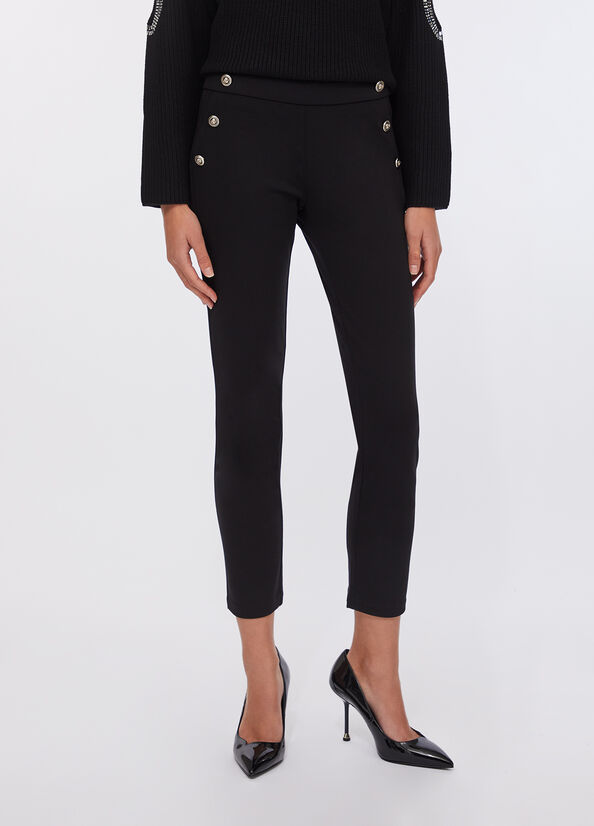 Pantaloni skinny con bottoni