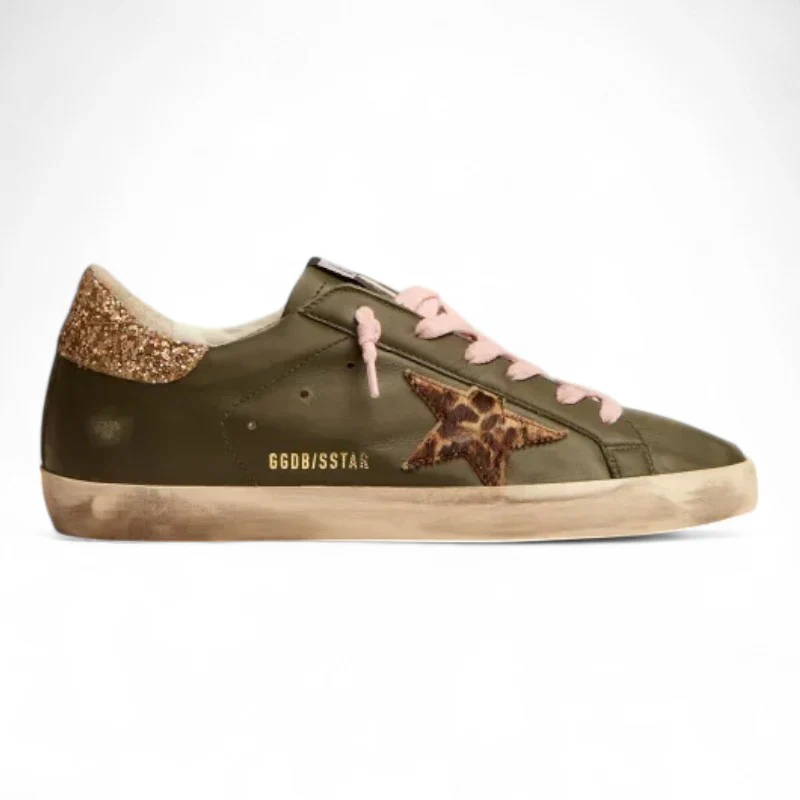 The Super-Star sneakers in dark green leather with a gold glitter heel tab