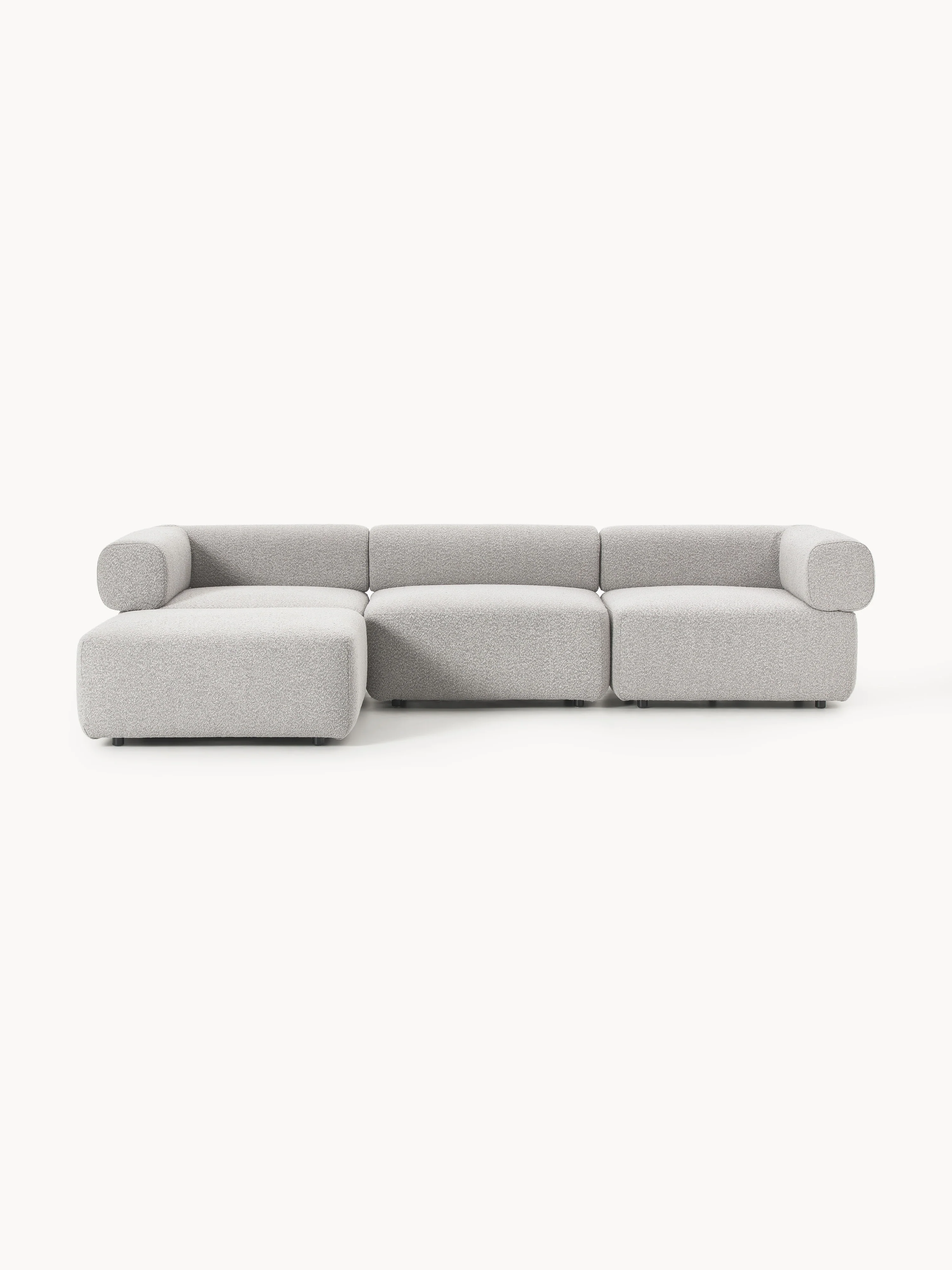 Modulares Bouclé-Sofa Anton (4-Sitzer) mit Hocker (links/rechts)