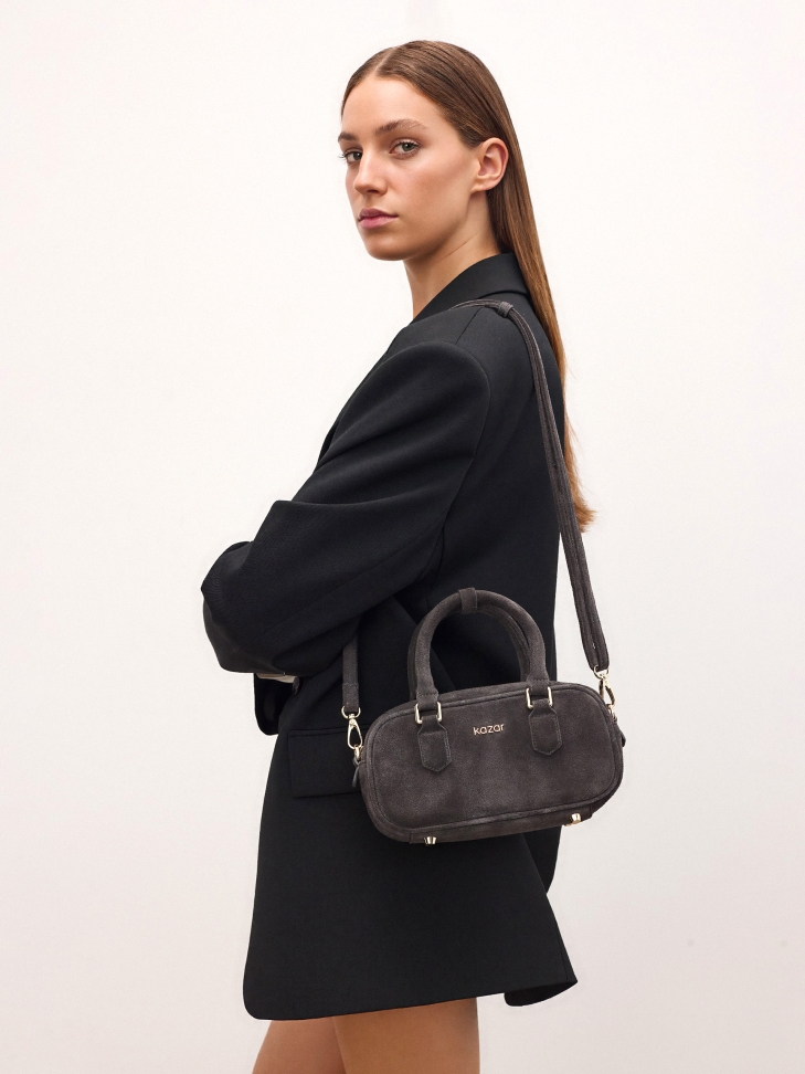 Small suede bowling bag with detachable strap