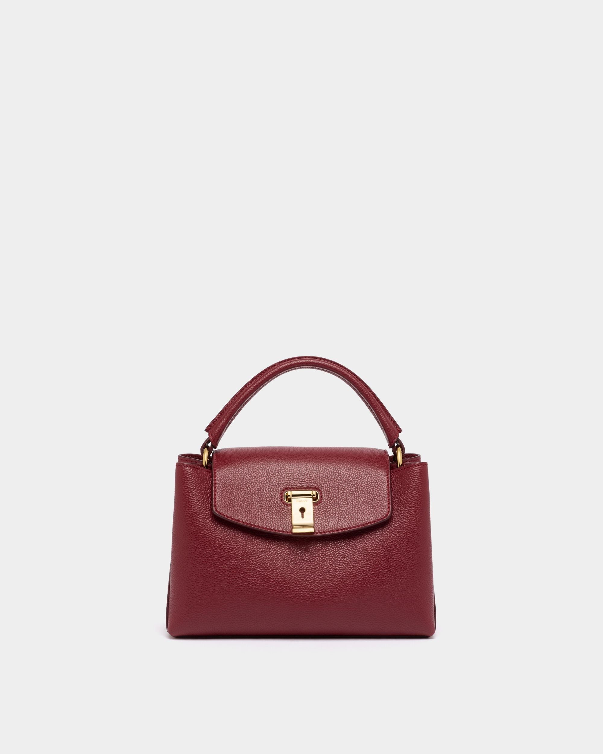 Lock Me Small Top Handle Bag in Ruby Red Grained Leather