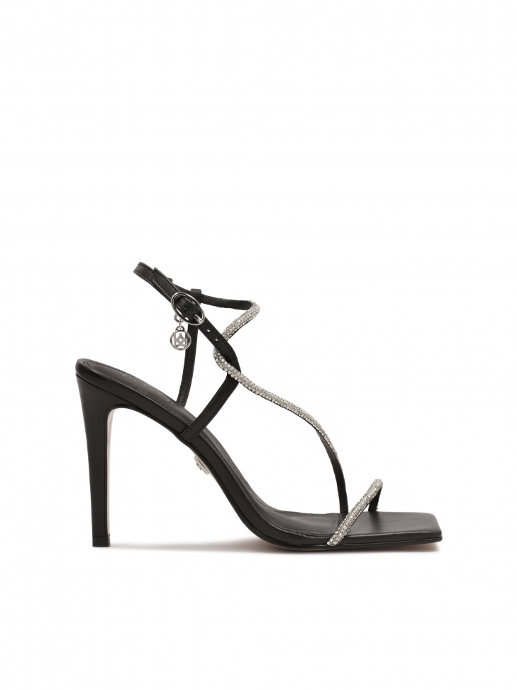 Black sandals with shiny straps
