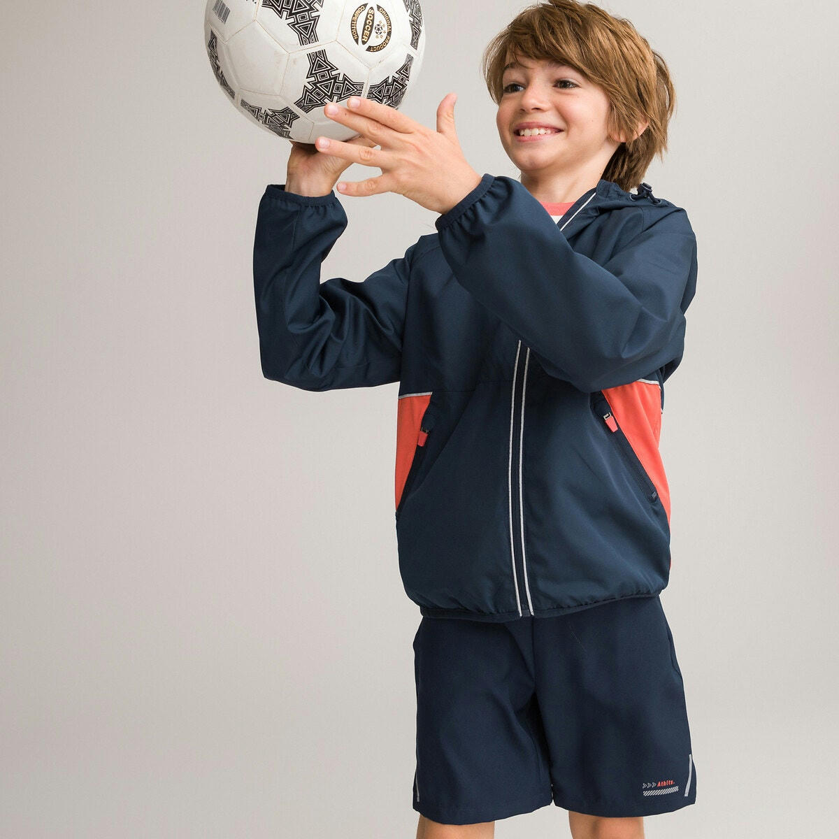 Coupe-vent de sport à capuche