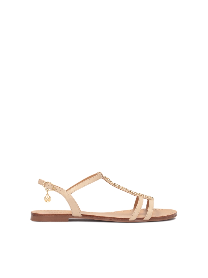 Beige leather sandals with ankle straps
