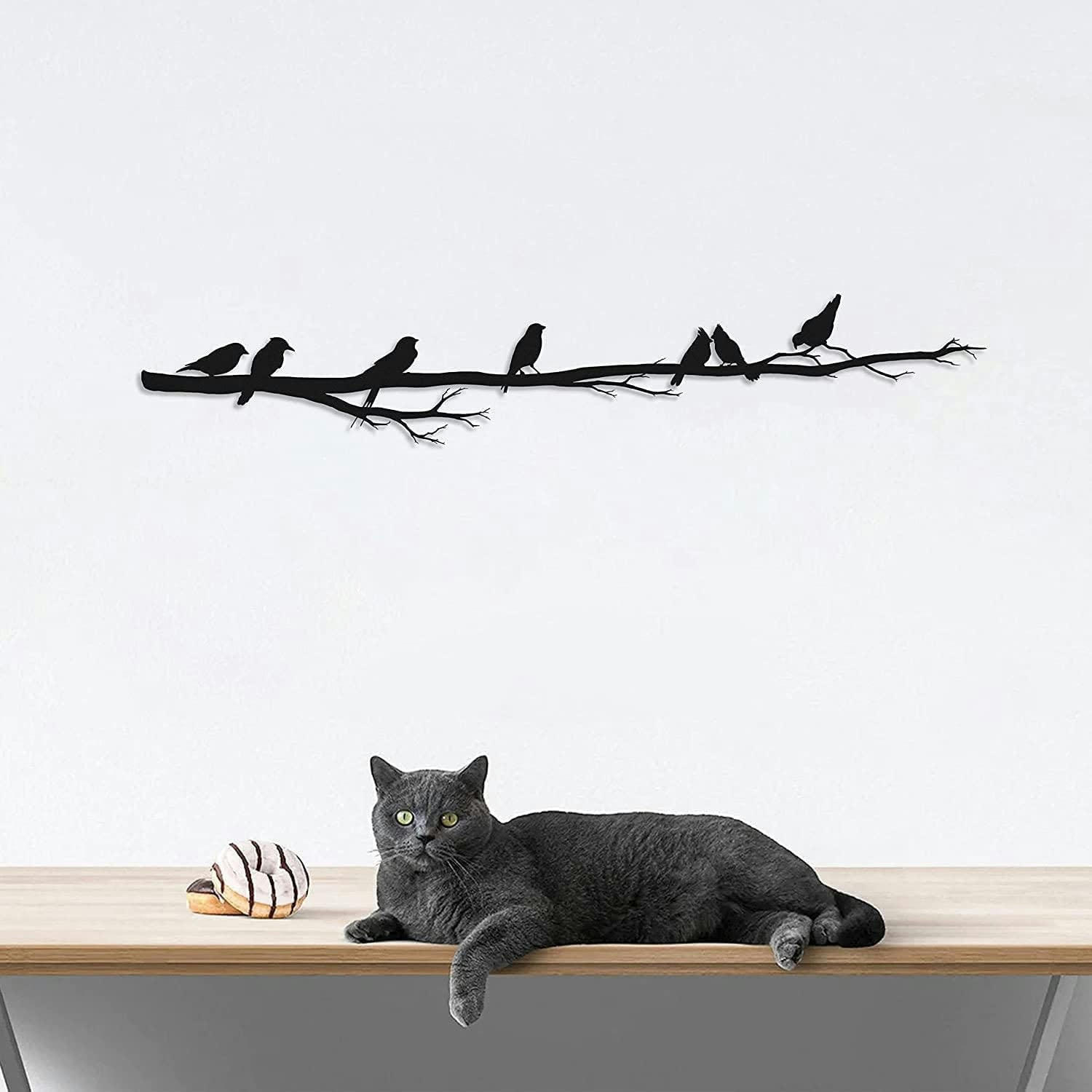 - Décoration murale oiseaux sur branche en métal noir 90x16 cm